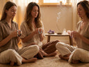 A group of women engage in collective manifestation using Yuè TerraBrio temple-blessed crystal bracelets. Each piece of jewelry carries a traceable energy signature from a traditional monastic blessing.
