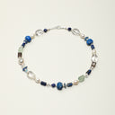 A handcrafted energy necklace featuring large tumbled Lapis Lazuli, Green Quartz, and Clear Quartz with 925 sterling silver accents, temple-consecrated for wisdom and clarity.