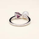Back detail of Heart in Bloom S925 silver ring with heart-cut garnet setting and freshwater pearl.