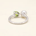 Back detail of Heart in Bloom silver ring with heart-shaped peridot setting and freshwater pearl.