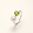 Heart in Bloom S925 sterling silver ring with 6 mm heart-shaped peridot and freshwater pearl.