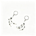 Pale Sentinel white trochus shell and black spinel hand-shaped drop earrings with stainless steel hoop fittings on a white background.
