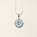 Yue TerraBrio quiet compass aquamarine pendant necklace with surrounding zircon accents and titanium steel chain.