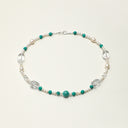 Yuè TerraBrio Veridian Truth necklace featuring bold 12mm Amazonite beads, irregular clear quartz, and delicate seed pearls, temple-blessed for courage.