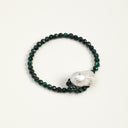Yue TerraBrio Architectural Will bracelet with geometric tiger’s eye cubes, a freshwater baroque teardrop pearl, and sterling silver details.