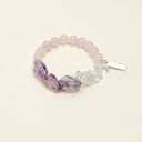 Yue TerraBrio Aura Nebula bracelet with freeform amethyst, clear quartz accents, rose quartz beads, and a silver tag.
