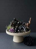 Black onyx gemstone display for Yue TerraBrio, representing strength, stability, grounded energy, and symbolic meaning.