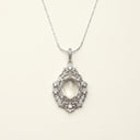 Yue TerraBrio Celestial Clarity pendant necklace with a smooth clear quartz center stone and titanium steel setting.
