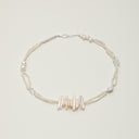 Yue TerraBrio Celestial Flow necklace with natural baroque pearls and Clear Quartz for emotional balance.