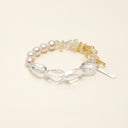 Yue TerraBrio Clear Glow bracelet with freeform clear quartz, citrine chips, spiral-textured beads, and a sterling silver logo tag.