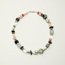 Yue TerraBrio Cosmic Symphony necklace with raw prehnite, amazonite, black tourmaline, clear quartz, citrine, baroque pearls, and sterling silver details.