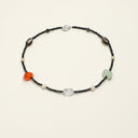 Yue TerraBrio Equilibrium Aura necklace with raw prehnite, carnelian, smoky quartz accents, dark mineral beads, freshwater pearls, and a sterling silver toggle clasp.