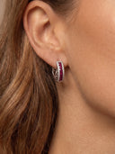 Model wearing the Yue TerraBrio Garnet Embrace hoop earrings with garnet stones, zircon accents, and S925 sterling silver.