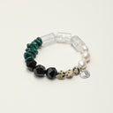 Yue TerraBrio Geometric Alignment bracelet with geometric black agate, raw malachite, clear quartz cylinders, baroque pearls, Dalmatian stone discs, and sterling silver details.