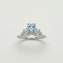 Yue TerraBrio Glacial Tiara adjustable ring with a heart-cut aquamarine, cubic zirconia leaf details, and a 925 sterling silver band.
