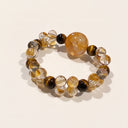 Yue TerraBrio Golden Momentum bracelet with yellow hematoid quartz, yellow tiger eye, and citrine beads in graduated 9–22mm sizes.
