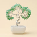 Yue TerraBrio green aventurine crystal bonsai tree featuring hand-twisted silver trunk and white ceramic pot, measuring 18cm by 7.5cm, temple-blessed for attracting fortune, opportunity, and cardiac chakra harmony.