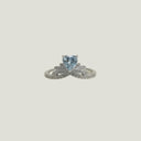 Yue TerraBrio Glacial Tiara adjustable ring with a heart-cut aquamarine, cubic zirconia leaf details, and a 925 sterling silver band.