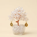 Yue TerraBrio Infinite Clarity clear quartz crystal tree with hand-twisted copper wire, clear glass pot, and tumbled stone base.