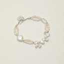Yue TerraBrio Lunar Harmony bracelet with natural Baroque pearls, seed pearls, and Clear Quartz for stress relief.