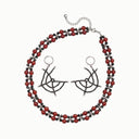 Yue TerraBrio Midnight Ember Black Spinel & Red Agate Necklace with matching Nocturne Web Black Spinel Earrings.