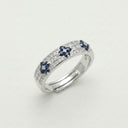 Yue TerraBrio Midnight Orbit adjustable ring with natural blue sapphires, cubic zirconia pavé, and a 925 sterling silver double-rail band.