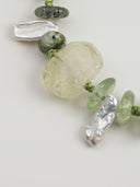 Close-up of freeform citrine with prehnite and long tooth baroque pearls in the Radiant Flourish bracelet.