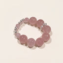Yue TerraBrio Rose Softness bracelet with 6–17mm rose quartz beads and shell pearls.