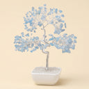 Yue TerraBrio Serene Flow aquamarine crystal tree with a hand-twisted silver-tone trunk and white ceramic base.