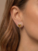 Model wearing the Yue TerraBrio Solar Heirloom citrine and zircon stud earrings in S925 sterling silver.