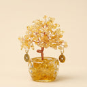 Yue TerraBrio Solar Radiance citrine crystal tree with hand-twisted copper wire, clear glass pot, and tumbled stone base.