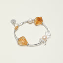 Yue TerraBrio Solar Resonance bracelet with Brazilian Citrine, geometric quartz, and pearls for abundance.