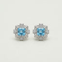 Yue TerraBrio Sovereign Sanctuary stud earrings with square-cut blue topaz, sterling silver filigree, and pavé accents.