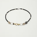 Yue TerraBrio Sovereign Synthesis statement necklace with black rutilated quartz, smoky quartz, citrine points, four-sided freshwater pearls, and a 925 sterling silver toggle clasp.