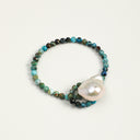 Yue TerraBrio Sovereign Wave bracelet with a large freshwater baroque pearl, faceted chrysocolla beads, and sterling silver details.