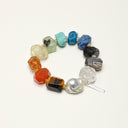 Yue TerraBrio Universal Resonance multi-gemstone bracelet with Lapis Lazuli, Citrine, and a large Baroque Pearl.