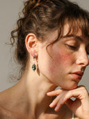 Yue TerraBrio Verdant Echo hoop earrings on a female model with Moss Agate and pearls for Heart Chakra balance.