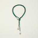 Yue TerraBrio long lariat necklace with faceted malachite beads, large baroque pearl accents, and sterling silver details.